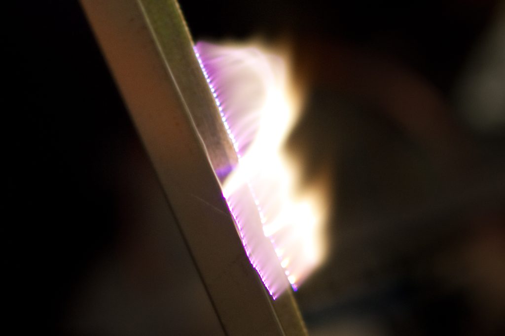 Artificial plasma produced in air by a Jacob's Ladder. The high potential difference between the two rods ionize particles in the air, creating a plasma. Credit: By Chocolateoak - Own work, CC BY-SA 3.0, https://commons.wikimedia.org/w/index.php?curid=12260232